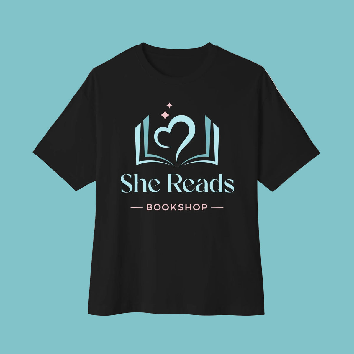 She Reads Bookshop Tee — Cozy Reading Logo Oversized T-Shirt
