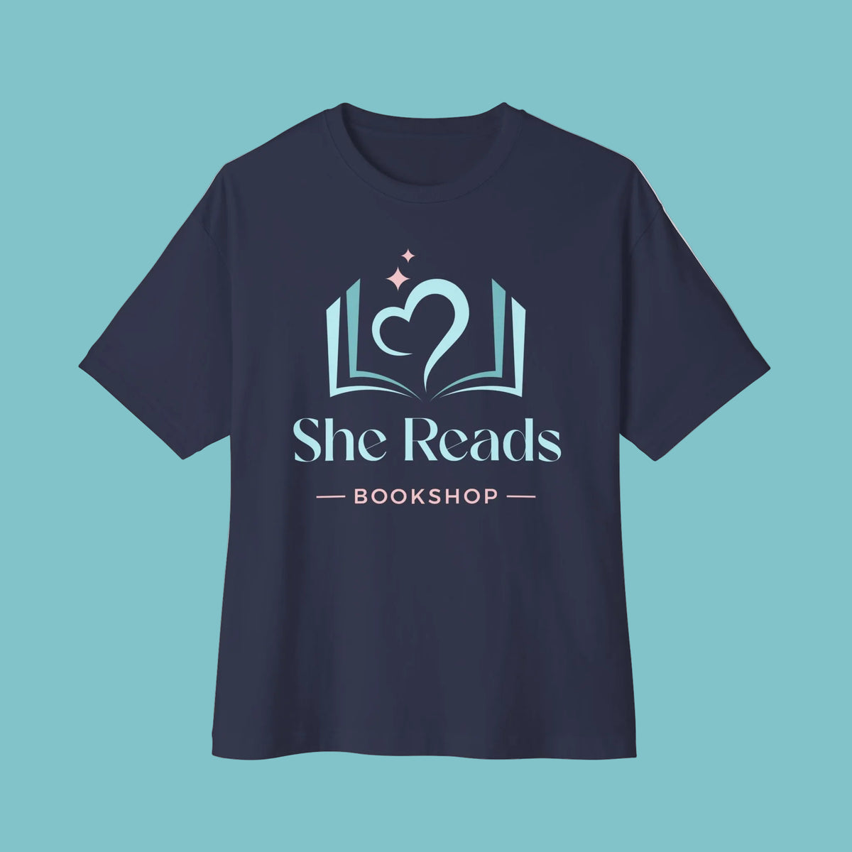 She Reads Bookshop Tee — Cozy Reading Logo Oversized T-Shirt