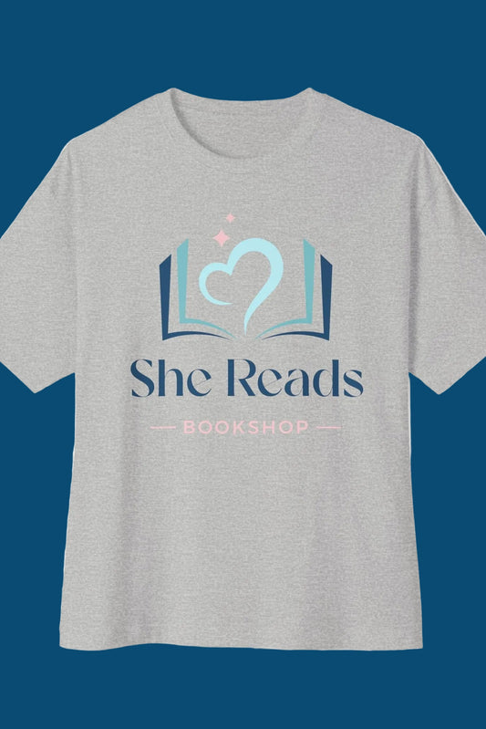 She Reads Bookshop Tee — Cozy Reading Logo Oversized T-Shirt